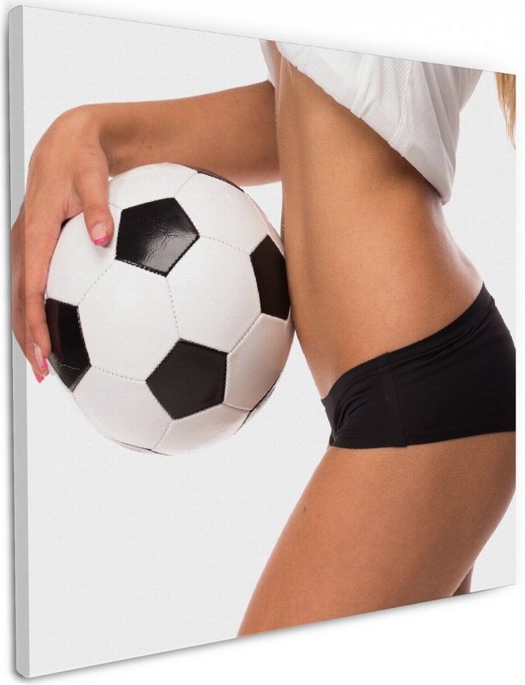 Wallario Leinwandbild, Fußball - sexy Frau mit einem Fußball, in verschiedenen Ausführungen von Wallario